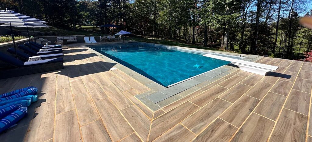 HDG Legno Walnut Porcelain Paver Pool Surround in Residential Application