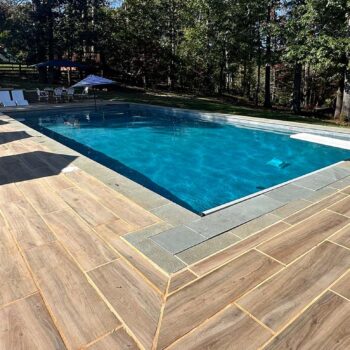 HDG Legno Walnut Porcelain Paver Pool Surround in Residential Application