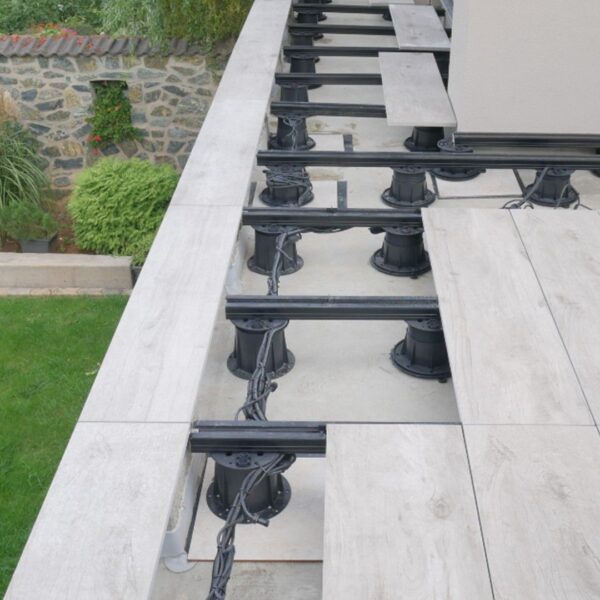 Buzon Pedestals with U-BRS Aluminum Joists and Porcelain Paver Planks on Rooftop Deck