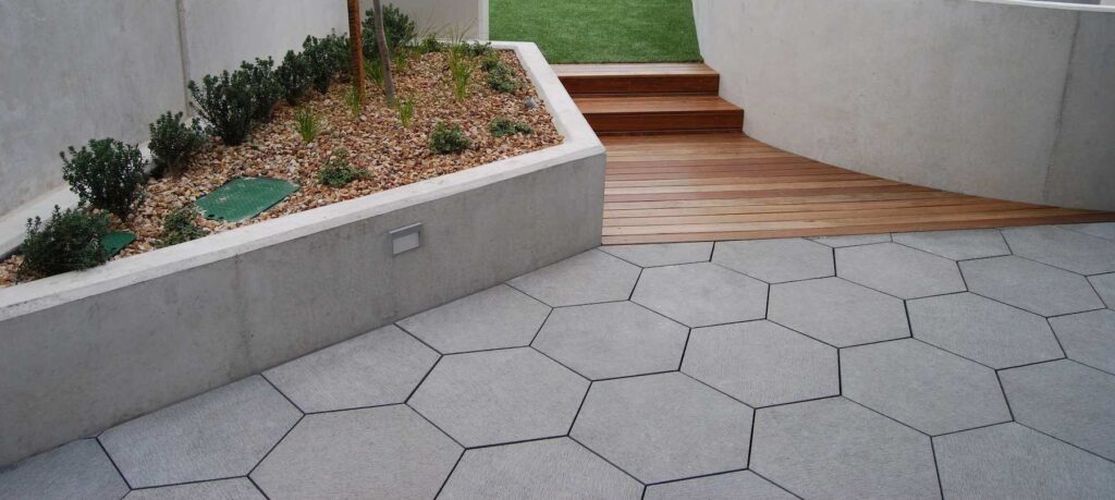Granite Look Concrete Pavers on Rooftop Deck with Pet Woof Deck and Wood Decking Over Buzon Pedestals