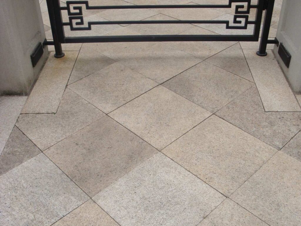Luxury home with natural granite stone pavers and creates grand entrance - HDG Building Materials