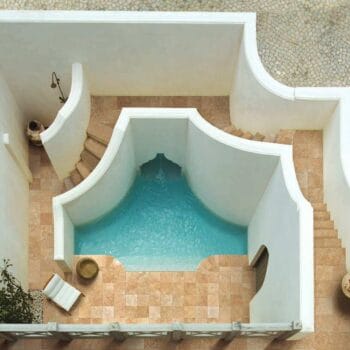 Trevino Walnut 60x60 cm Porcelain Pavers with Travertine Finish on Stairs and Pool Surround