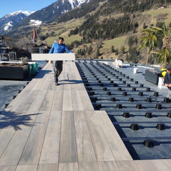 Buzon E-BRS Easy Rail System with Large Format Wood Look Porcelain Planks.