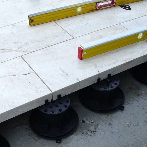 Terrace with Travertine Stone Pavers over Buzon Pedestals with Slope Correction