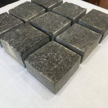 Sample layout of HDG Black Sea Blue Granite cobblestones arranged for paving design visualization.