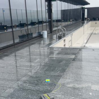 Delta Grey Granite on Rooftop Pool Terrace