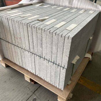 Delta grey granite kerf-cut pavers being custom crated