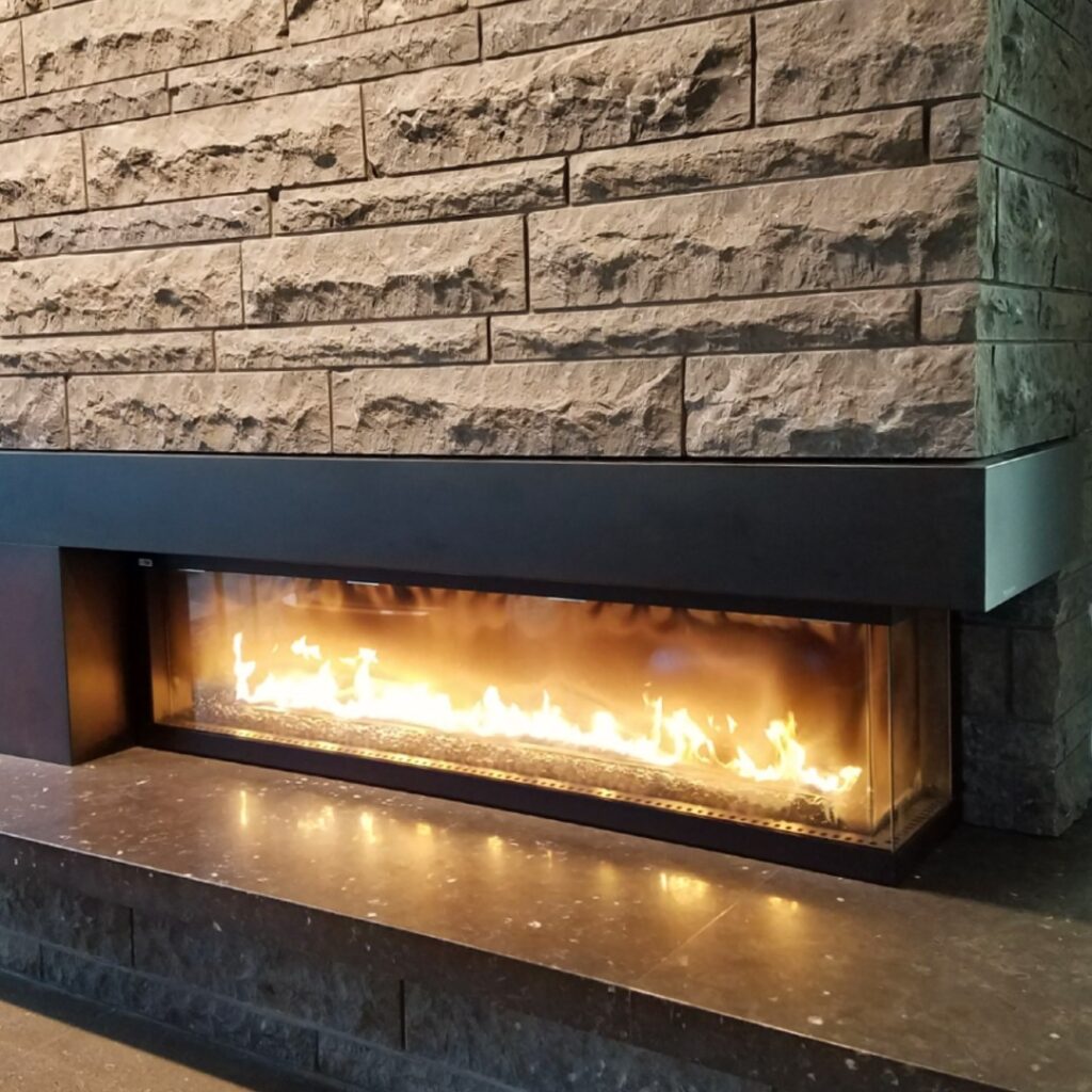 Honed Finish on HDG Perlino Grey Limestone Reduces Glare from Fireplace and Lighting