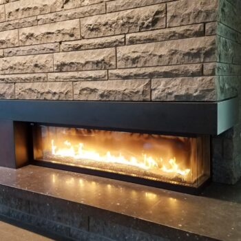 Honed Finish on HDG Perlino Grey Limestone Reduces Glare from Fireplace and Lighting