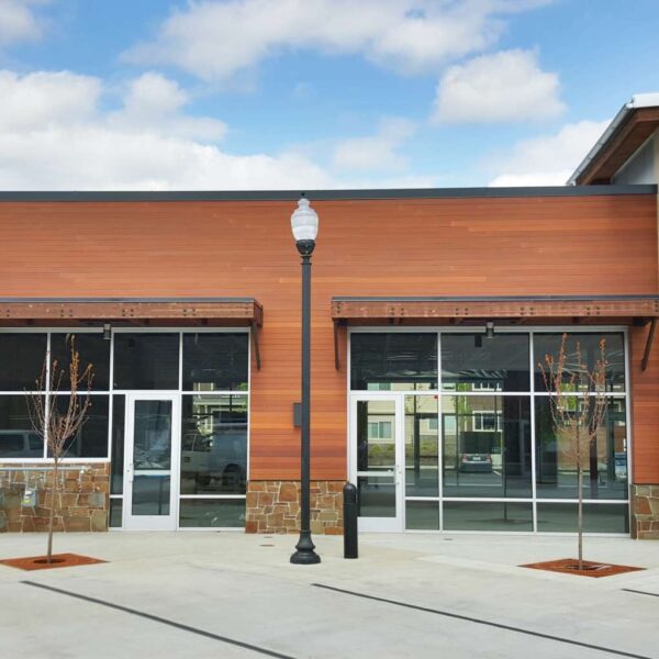 Resysta Siding Contrasted with Glass Metal and Stone