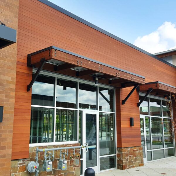 Resysta Facade Contrasted with Brick and Metalwork