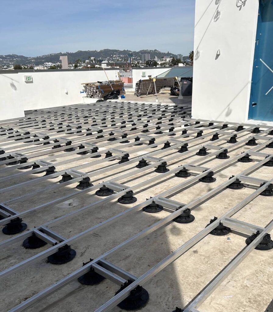 Universal Aluminum Joist grid over Buzon Pedestals on Rooftop Deck