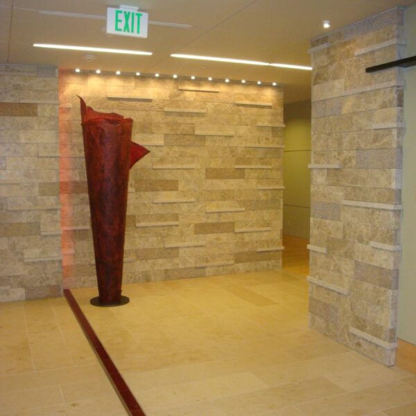 Lobby setting with interior application of pineapple stone finish on granite.