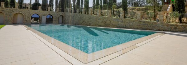 Rosca Gold porcelain paver pool deck.